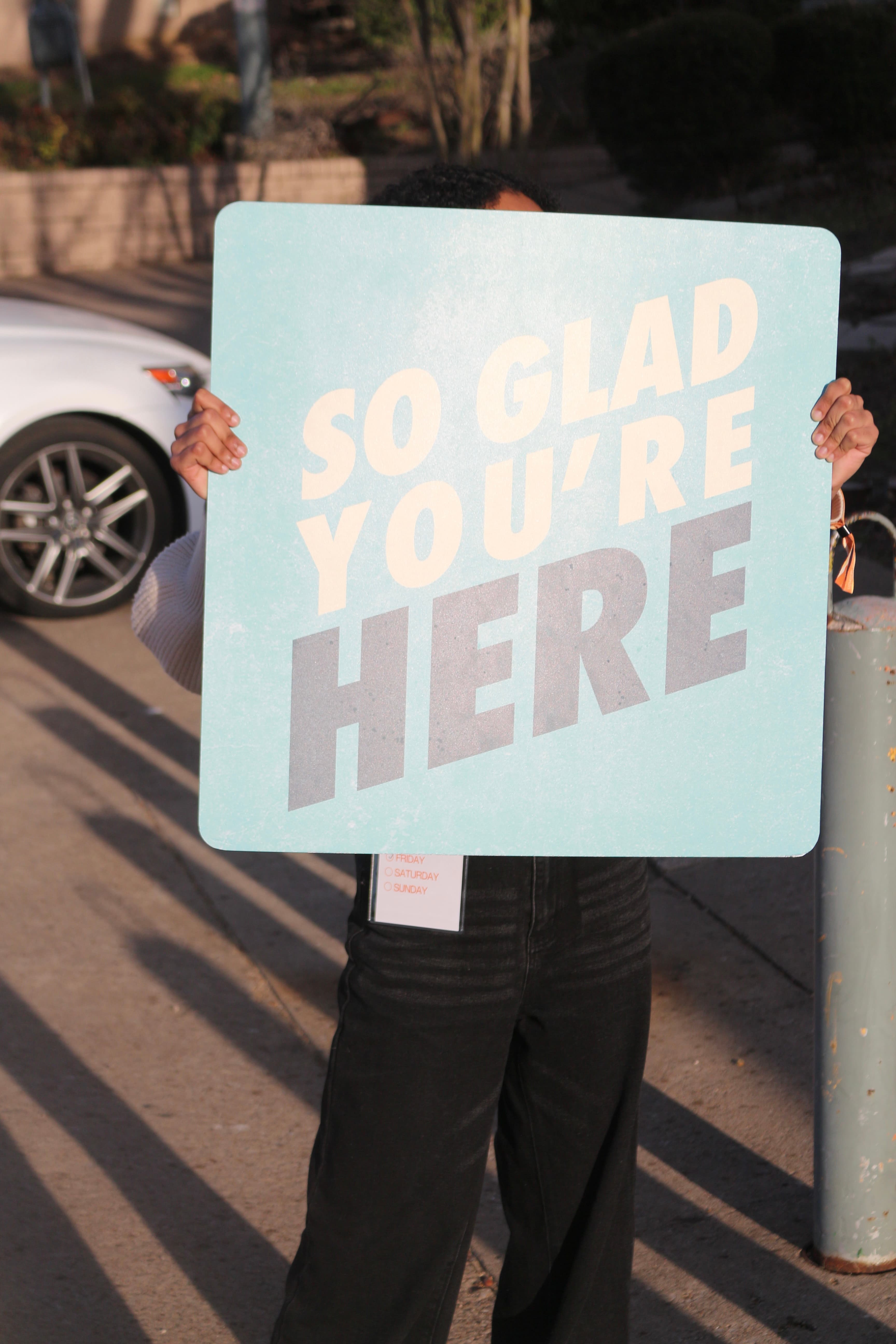 Welcome sign 'So glad you're here'